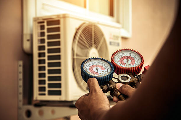 Professional Ac Installation technician working in Hamlet, NC